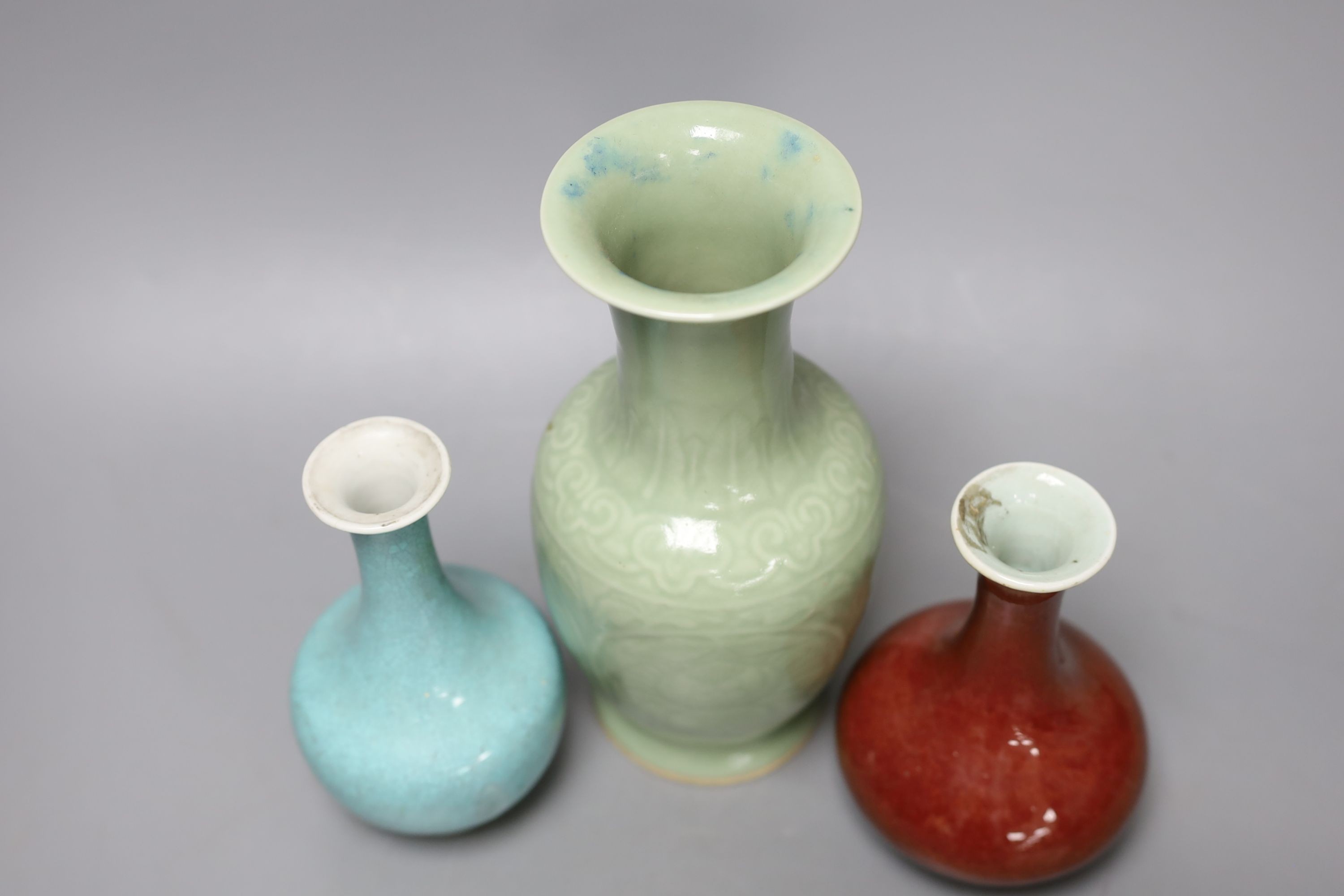 Three 19th Chinese monochrome glazed vases, with sang de boeuf, celadon and turquoise crackle glaze, tallest 21 cm
